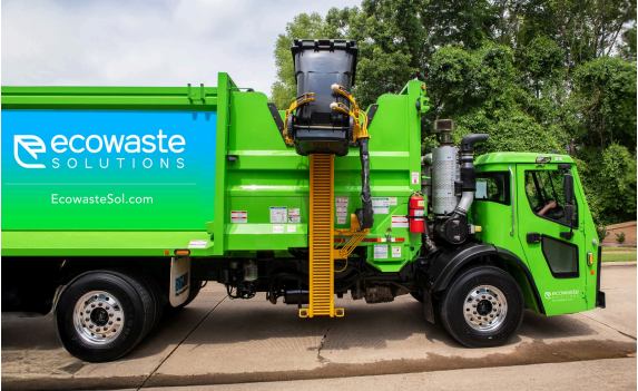 Lime green garbage truck with Ecowaste logo on the bin.
